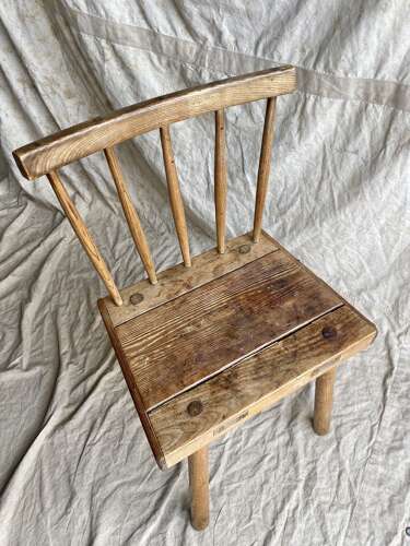 An antique 19th century vernacular Irish hedge chair