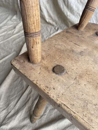 An antique late 19th century Irish famine hedge chair