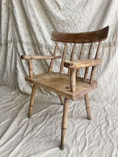 An antique late 19th century Irish famine hedge chair