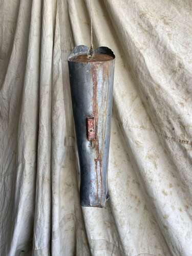 An antique early 20th century English bootmakers metal trade sign