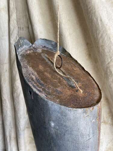 An antique early 20th century English bootmakers metal trade sign