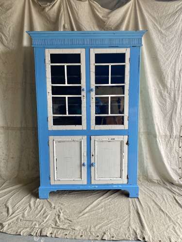 A large antique 19th century Irish glazed painted pine kitchen cupboard