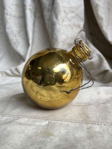 A rare antique 19th century amber mercury glass witches ball bottle