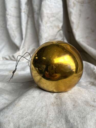 A rare antique 19th century amber mercury glass witches ball bottle