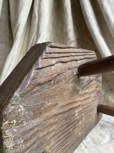 A rustic antique 19th century Welsh pine dairy stool