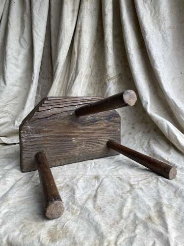 A rustic antique 19th century Welsh pine dairy stool