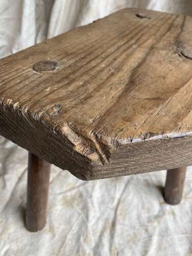 A rustic antique 19th century Welsh pine dairy stool