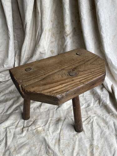 A rustic antique 19th century Welsh pine dairy stool