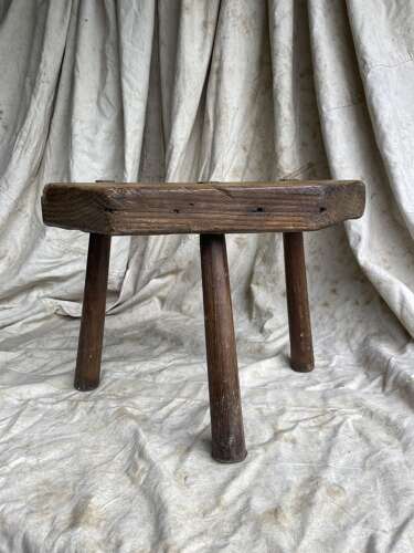 A rustic antique 19th century Welsh pine dairy stool