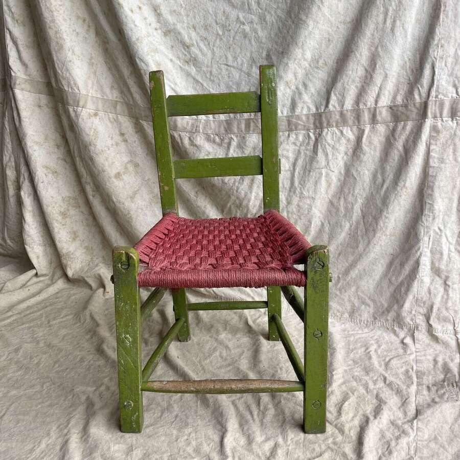 An original 19th century antique Irish painted pine Sugan chair.