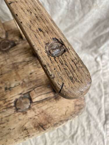 A wide antique elm and ash 19th century Irish famine hedge chair
