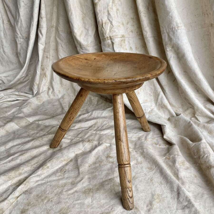 A mid 19th century antique Welsh pole lathe turned dairy stool