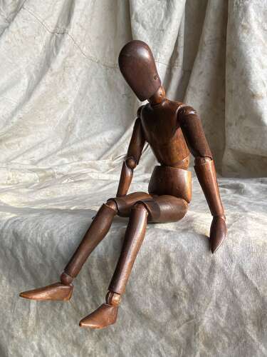 An antique early 20th century Italian wooden artist's articulated lay figure mannequin