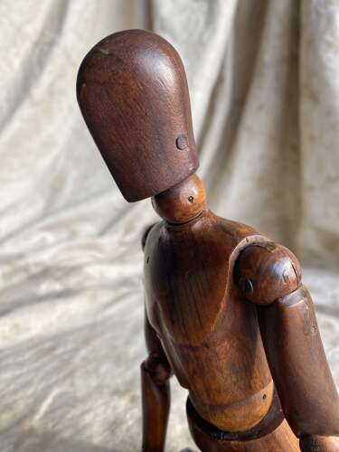 An antique early 20th century Italian wooden artist's articulated lay figure mannequin
