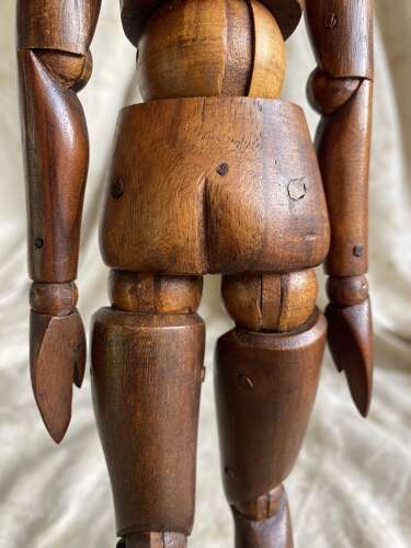 An antique early 20th century Italian wooden artist's articulated lay figure mannequin