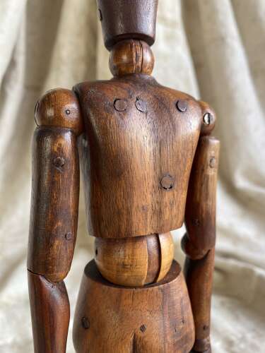 An antique early 20th century Italian wooden artist's articulated lay figure mannequin