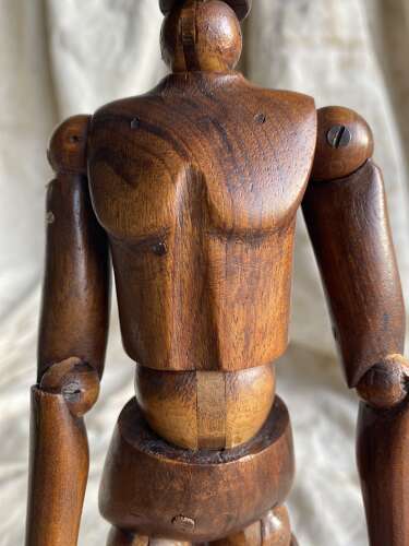 An antique early 20th century Italian wooden artist's articulated lay figure mannequin