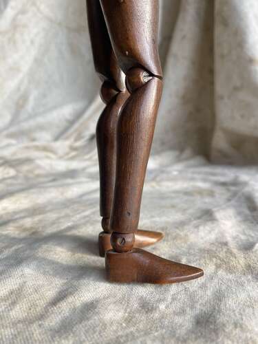 An antique early 20th century Italian wooden artist's articulated lay figure mannequin