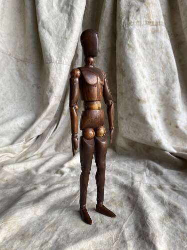 An antique early 20th century Italian wooden artist's articulated lay figure mannequin