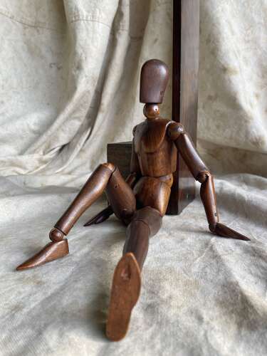 An antique early 20th century Italian wooden artist's articulated lay figure mannequin