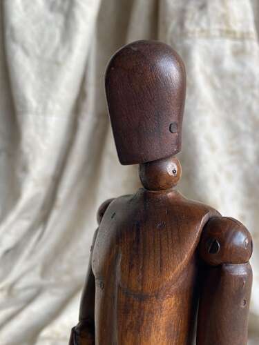 An antique early 20th century Italian wooden artist's articulated lay figure mannequin