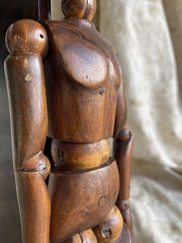 An antique early 20th century Italian wooden artist's articulated lay figure mannequin