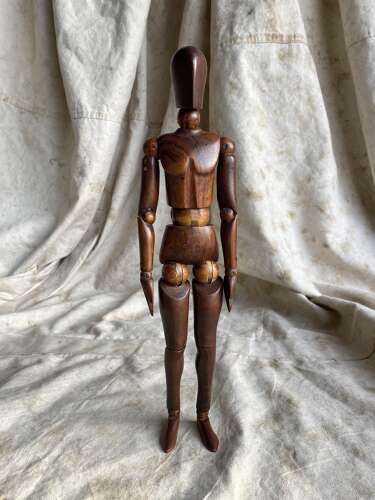 An antique early 20th century Italian wooden artist's articulated lay figure mannequin