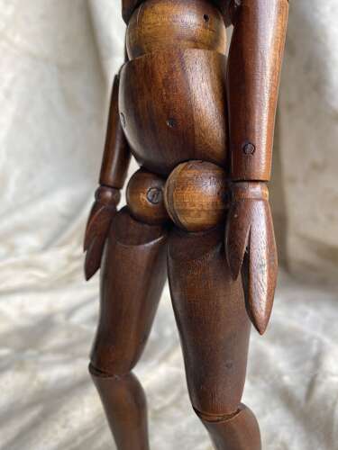 An antique early 20th century Italian wooden artist's articulated lay figure mannequin