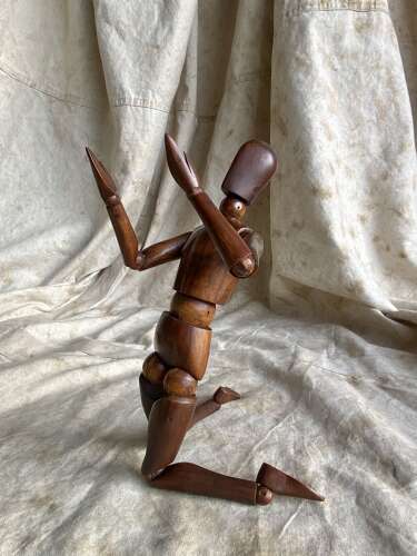 An antique early 20th century Italian wooden artist's articulated lay figure mannequin
