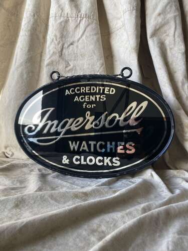 An early 20th century antique double sided glass advertising sign for Ingersoll watches