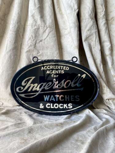An early 20th century antique double sided glass advertising sign for Ingersoll watches