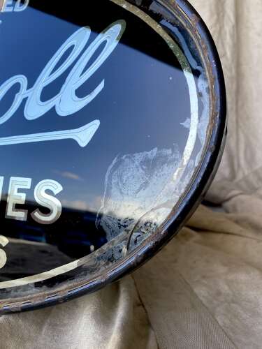 An early 20th century antique double sided glass advertising sign for Ingersoll watches