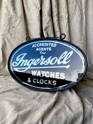 An early 20th century antique double sided glass advertising sign for Ingersoll watches