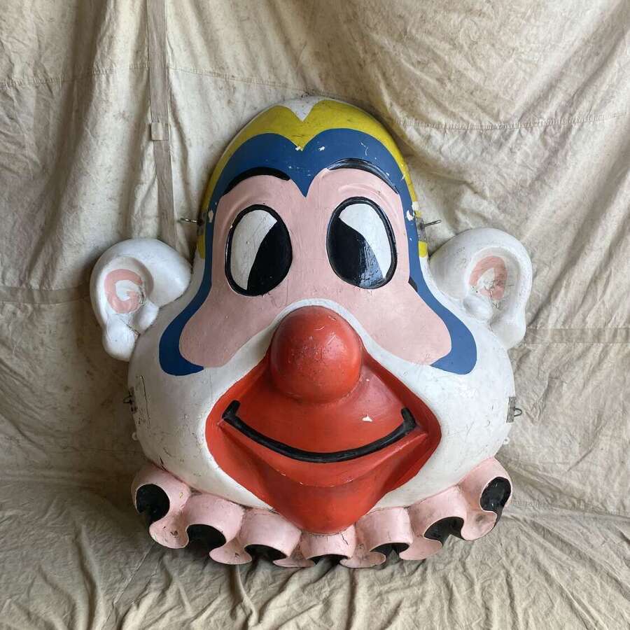 A wonderful unique vintage 1960s circus advertising large wall mounting painted clown face