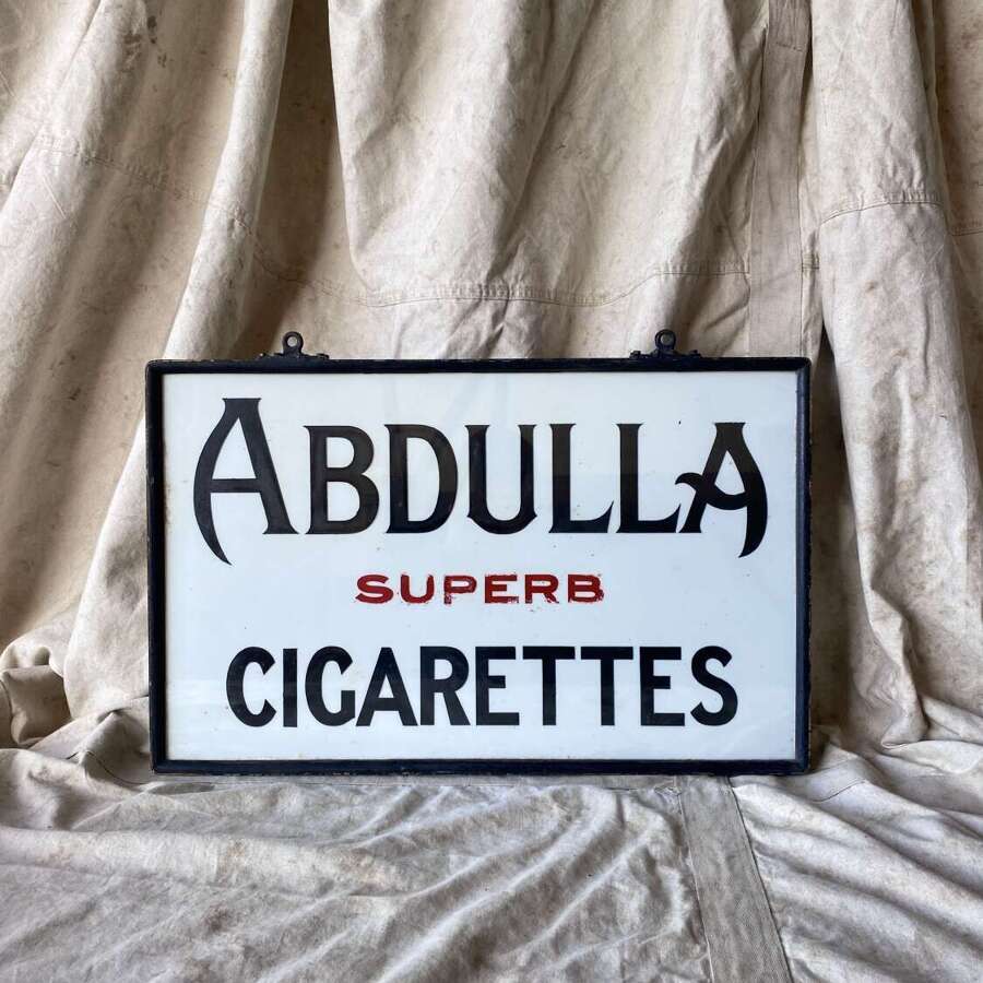 An antique 1920s Abdulla Cigarettes milk glass double sided advertising sign