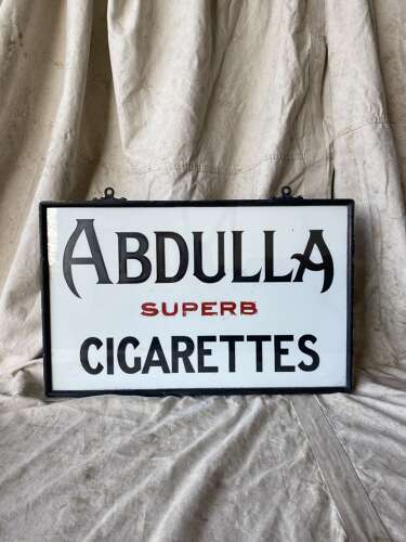 An antique 1920s Abdulla Cigarettes milk glass double sided advertising sign