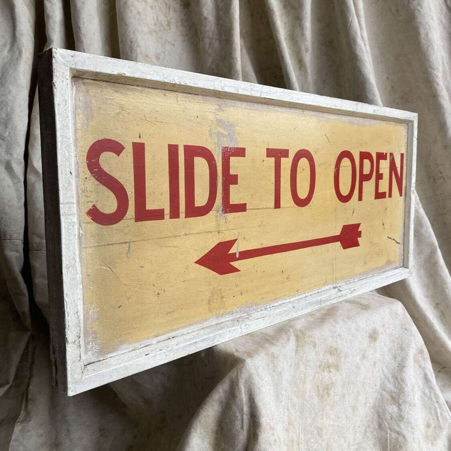 A 1950s vintage hand painted wooden banana factory sign