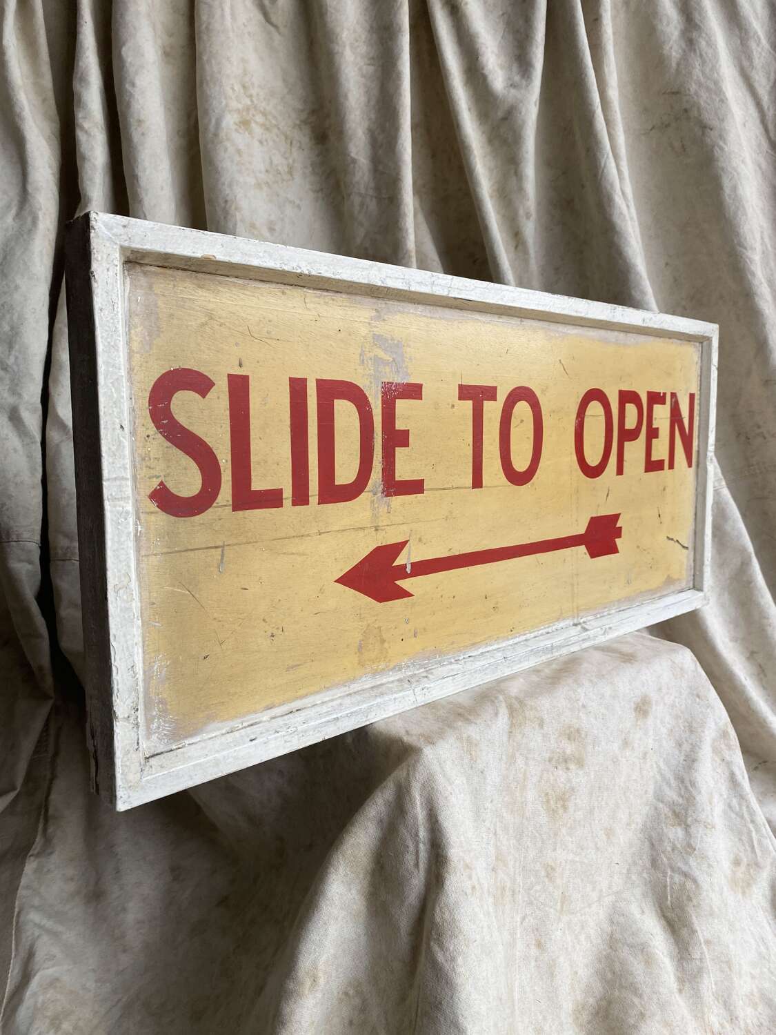 A 1950s vintage hand painted wooden banana factory sign