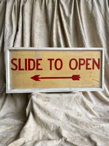 A 1950s vintage hand painted wooden banana factory sign