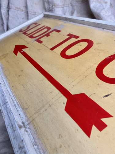 A 1950s vintage hand painted wooden banana factory sign