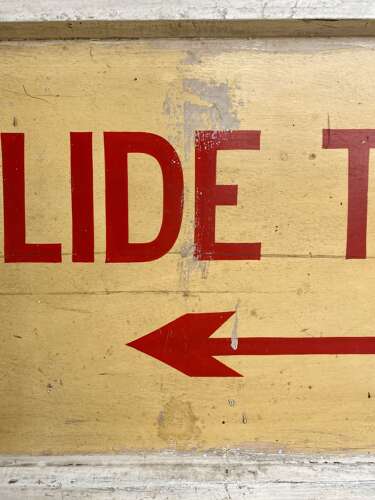 A 1950s vintage hand painted wooden banana factory sign