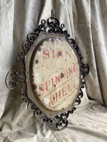 A rare early 19th century antique hand painted ornate wrought iron double sided pub sign