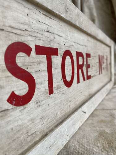 A 1950s vintage hand painted wooden Store no.1 factory sign