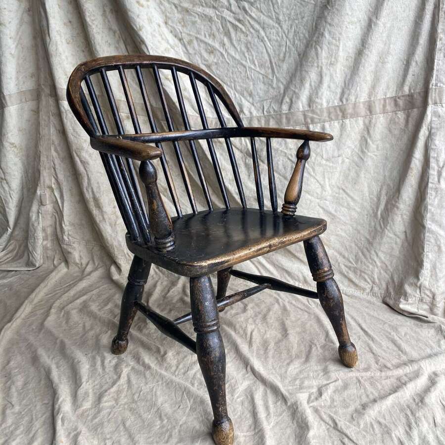 A mid 19th century antique Lincolnshire low stick back Windsor armchair