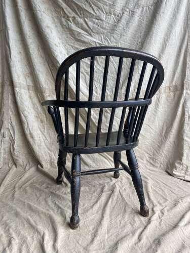 A mid 19th century antique Lincolnshire low stick back Windsor armchair