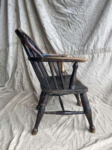 A mid 19th century antique Lincolnshire low stick back Windsor armchair