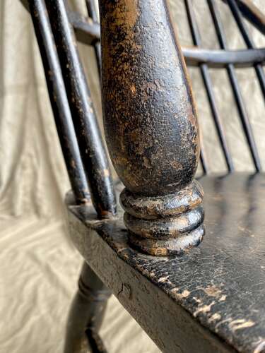 A mid 19th century antique Lincolnshire low stick back Windsor armchair