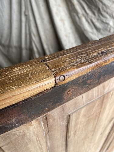 A remarkable rare 8ft early 17th century antique elm and pine barrel back tavern settle