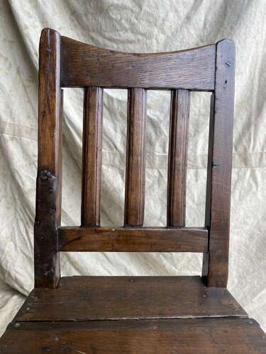 A Georgian primitive Irish oak antique farmhouse chair