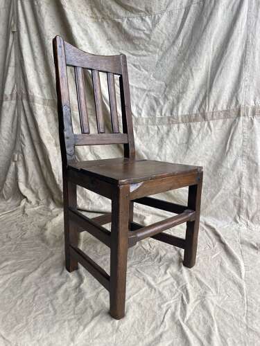A Georgian primitive Irish oak antique farmhouse chair